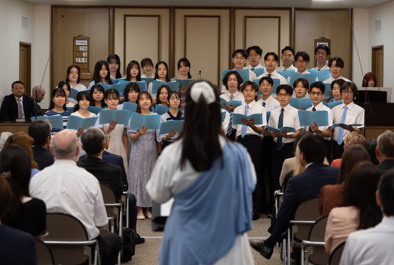 Une chorale chante lors de la réunion du 125e anniversaire au Japon, à Yamate, Yokohama, le 30 août 2026.