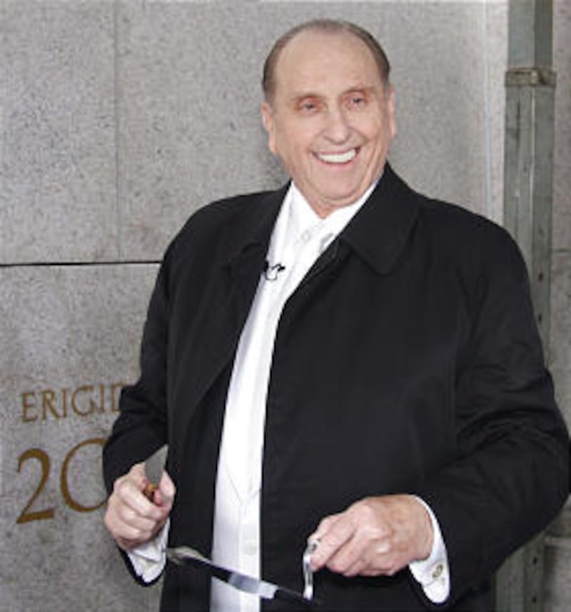 The late President Thomas S. Monson applies mortar during the cornerstone ceremony of the Curitiba Brazil Temple dedication on June 1, 2008.
