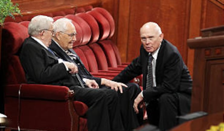 President Boyd K. Packer and Elder L. Tom Perry visit with Elder Dallin H. Oaks, from left, prior to the Sunday morning session of The Church of Jesus Christ of Latter-day Saints' 181st Annual General Conference, April 3, 2011, in Salt Lake City, Utah.
