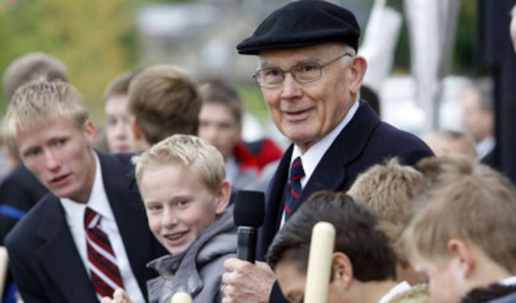 Elder Dallin H. Oaks of the Quorum of the Twelve stands with 12-year-old deacons from the Payson area he invited to take part in the ceremony as thousands turned out in the rain Saturday, Oct. 8, 2011, for the groundbreaking for the Payson Utah Temple.