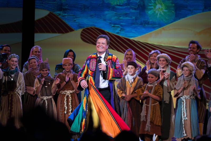Donny Osmond et des membres de la famille Osmond lors de la Conférence des femmes de BYU au Marriott Center à Provo, Utah, le mercredi 30 avril 2025.