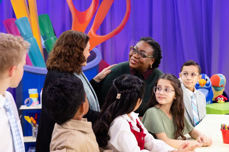 Sister Tracy Y. Browning, Sister Susan Gong and children talk during the filming of the May 2026 Friend to Friend broadcast.